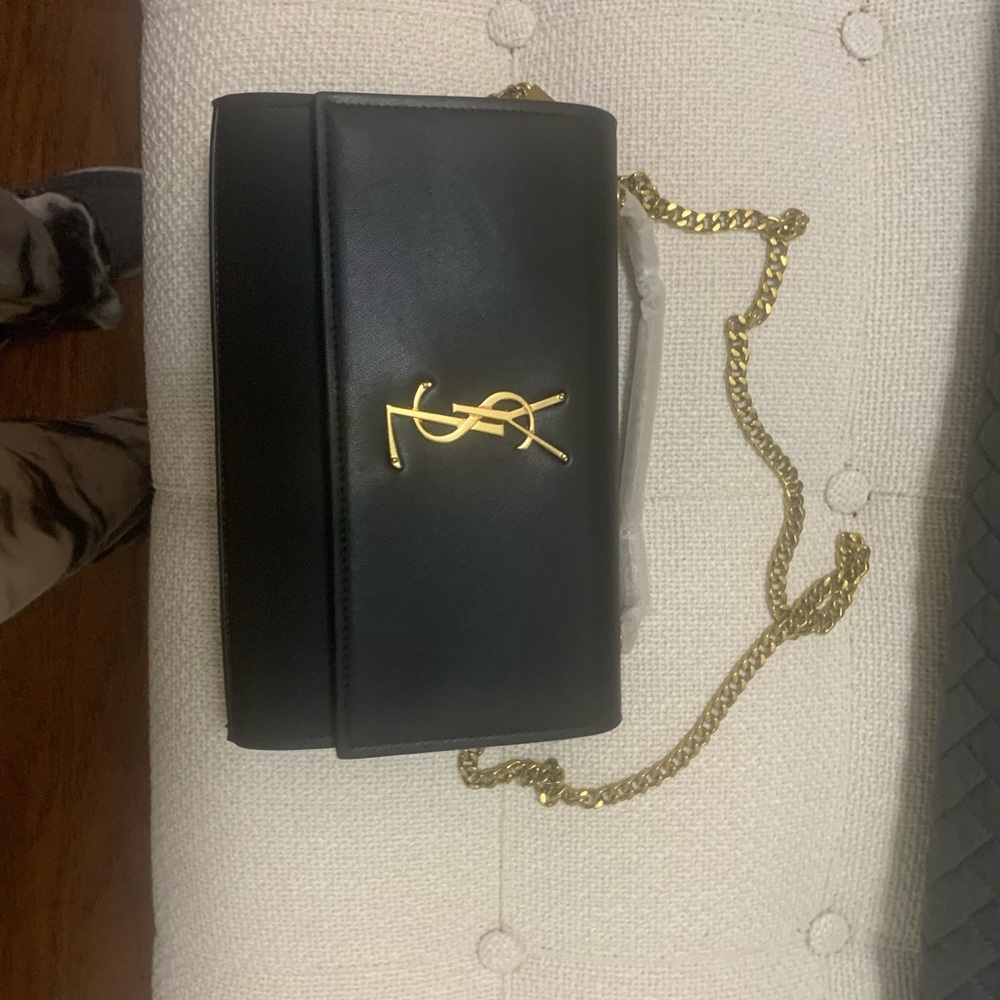 Knock off ysl purse brand new. Beautiful look alike.